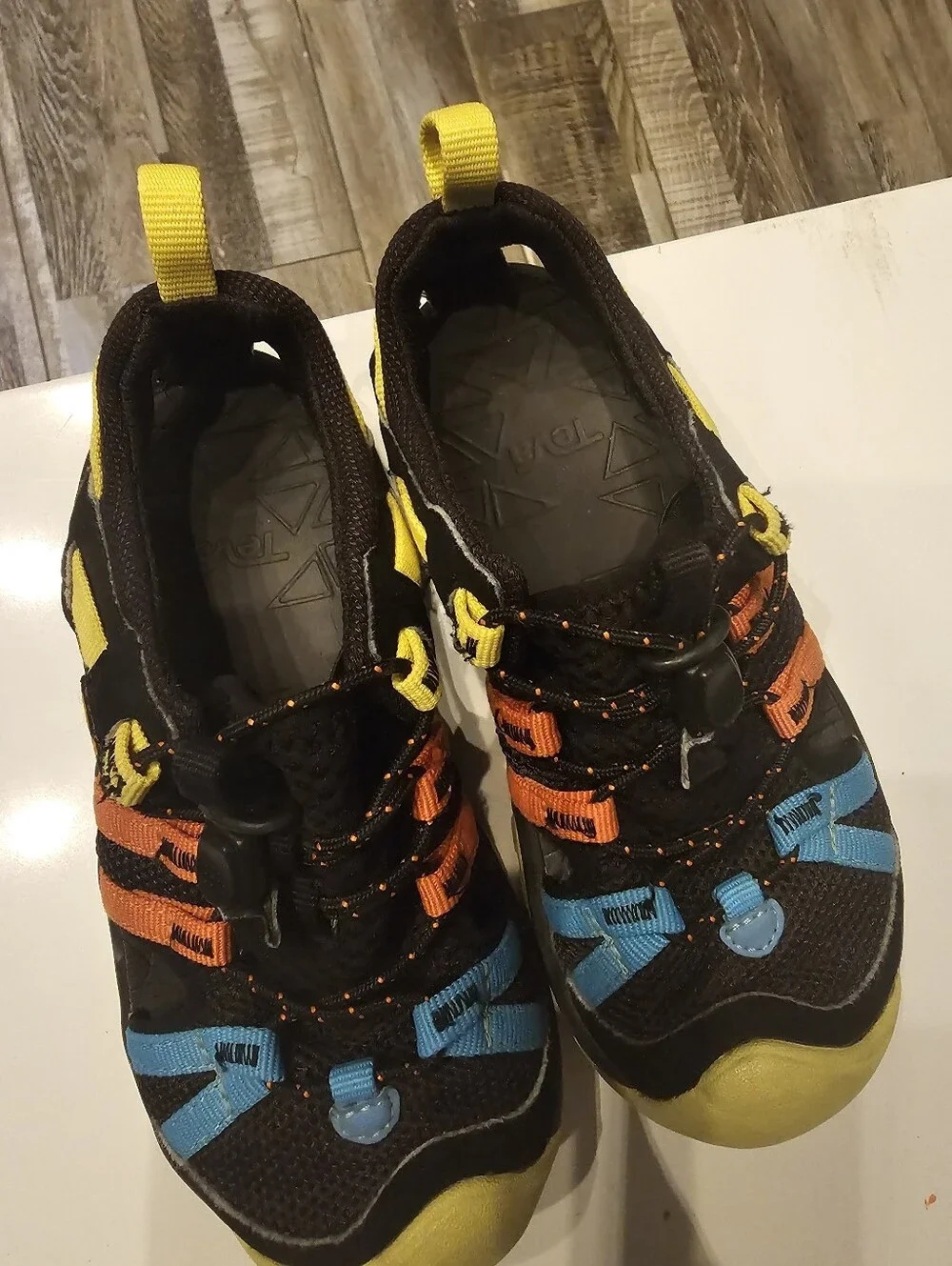 Teva Kids Black Water Shoes with Blue, Orange & Yellow Accents